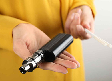 e-cigarette in hand
