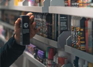 person shopping in vape store