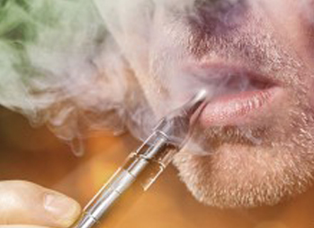 person vaping in e-cigarettes