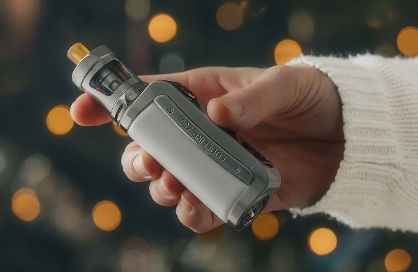 A Vape Beginner holding a E-cigarette